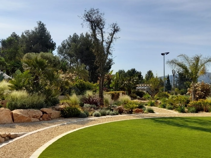 Charlesworth Gardens — modern garden with lawn and palms Costa Blanca