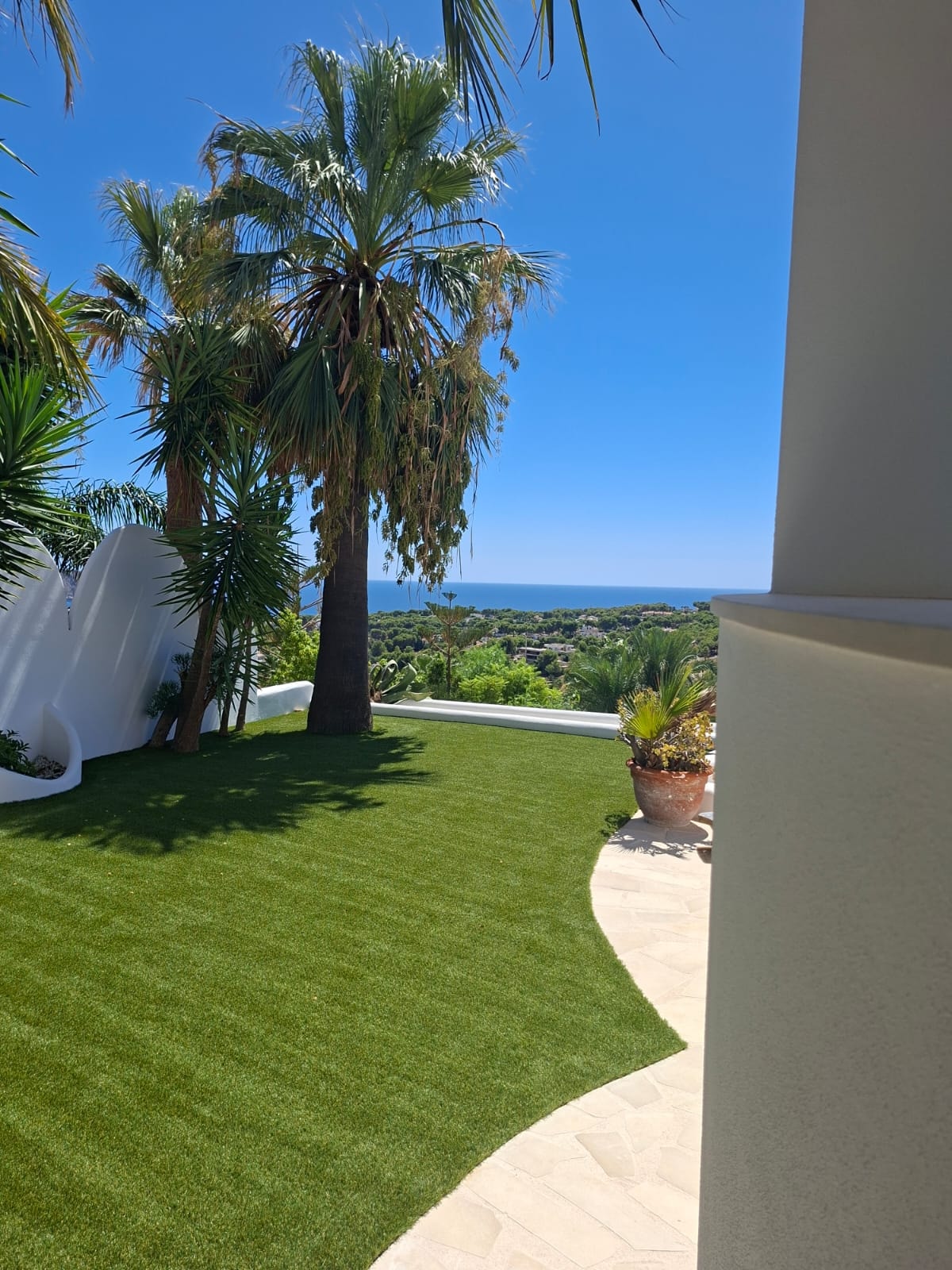 Artificial grass villa garden installation Spain