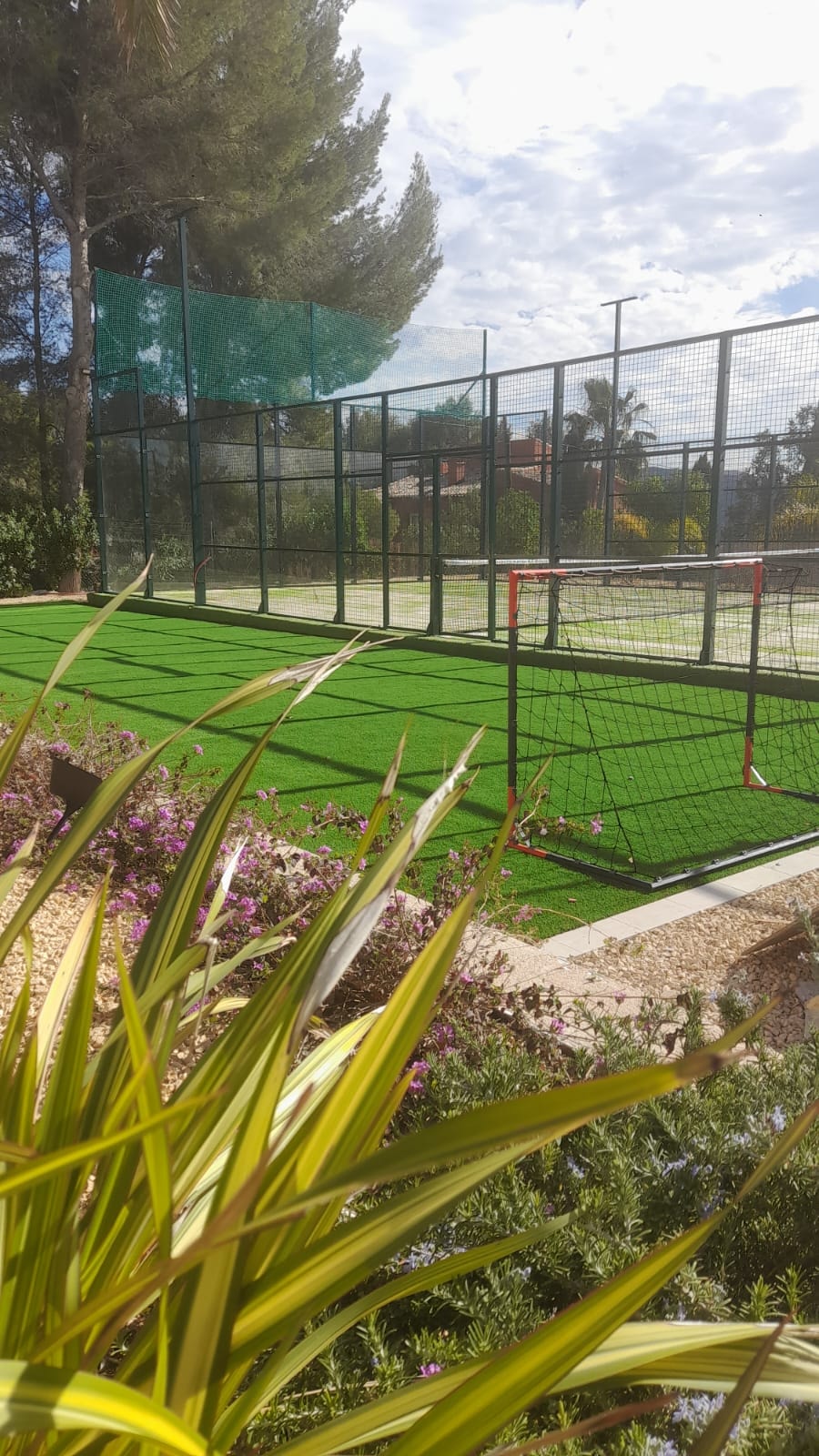 Home padel court area with artificial grass Spain