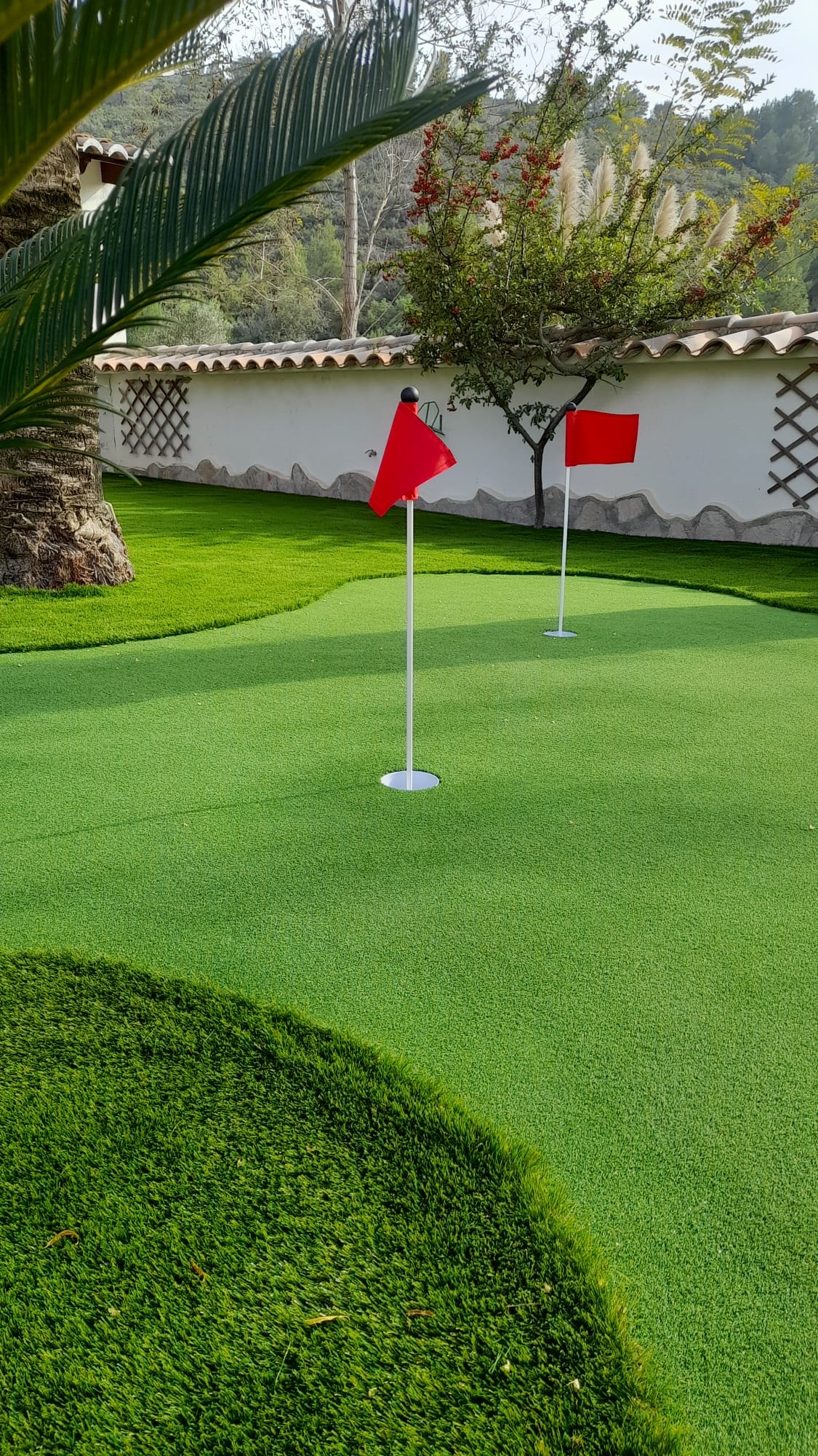 Luxury home golf area with palm trees and mountain views Costa Blanca