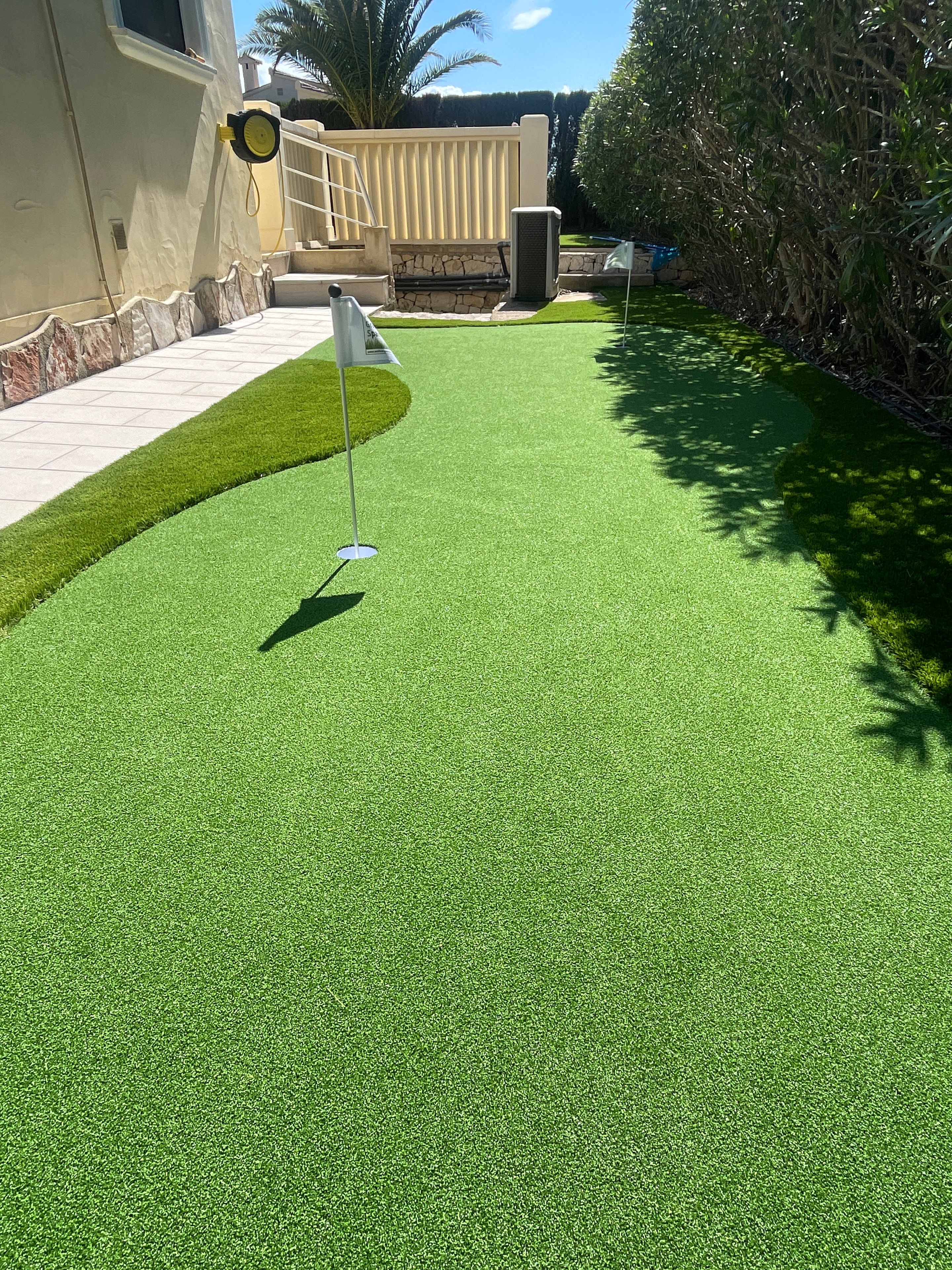 Residential backyard putting green with artificial grass Costa Blanca