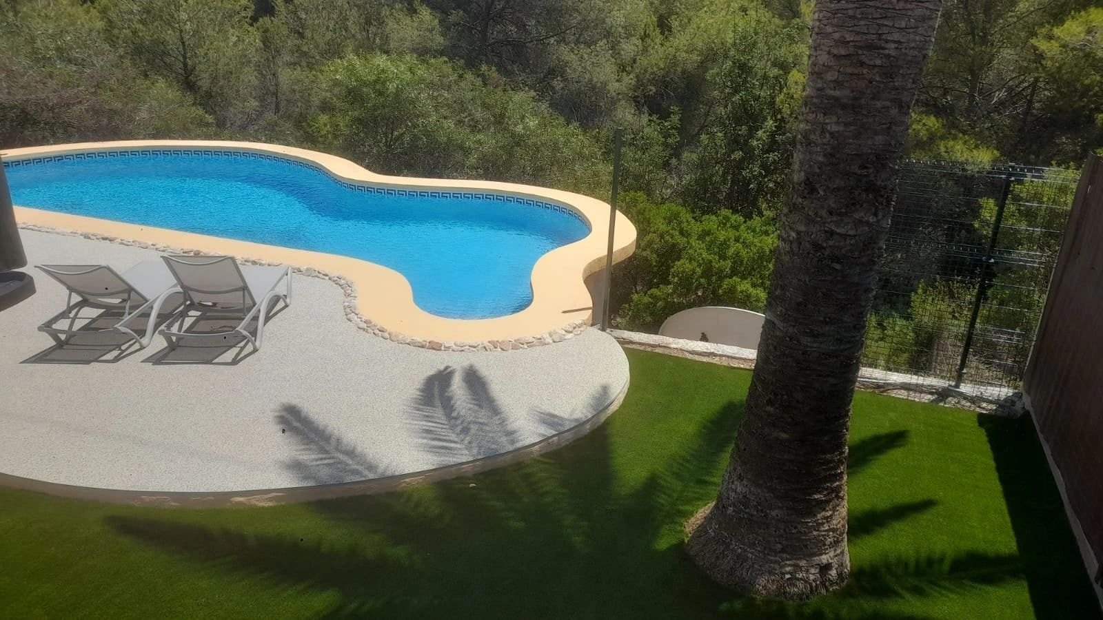 Pool surround with artificial grass and mountain views Costa Blanca